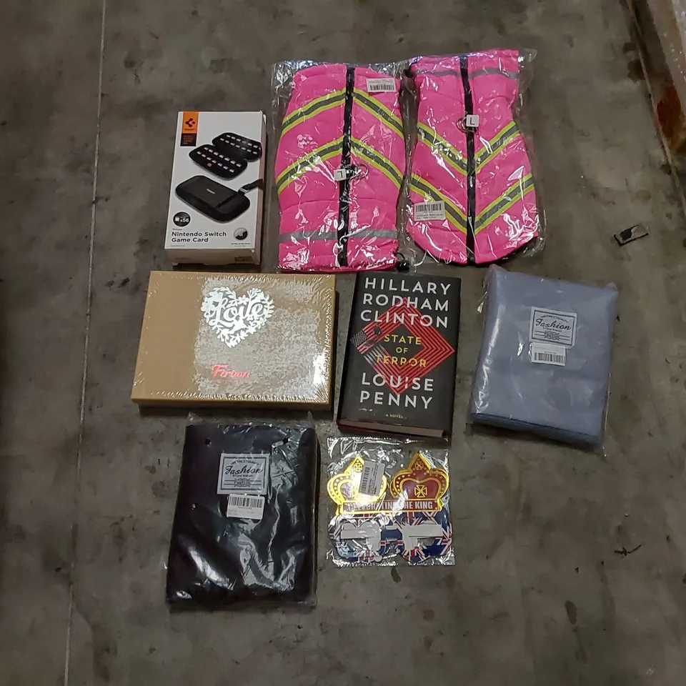 PALLET OF ASSORTED HOUSEHOLD ITEMS AND CONSUMER PRODUCTS. INCLUDES BOOKS, TRAVEL DUFFLE BAGS, DOG COAT JACKETS, NINTENDO SWITCH GAME CARD CASE ETC 