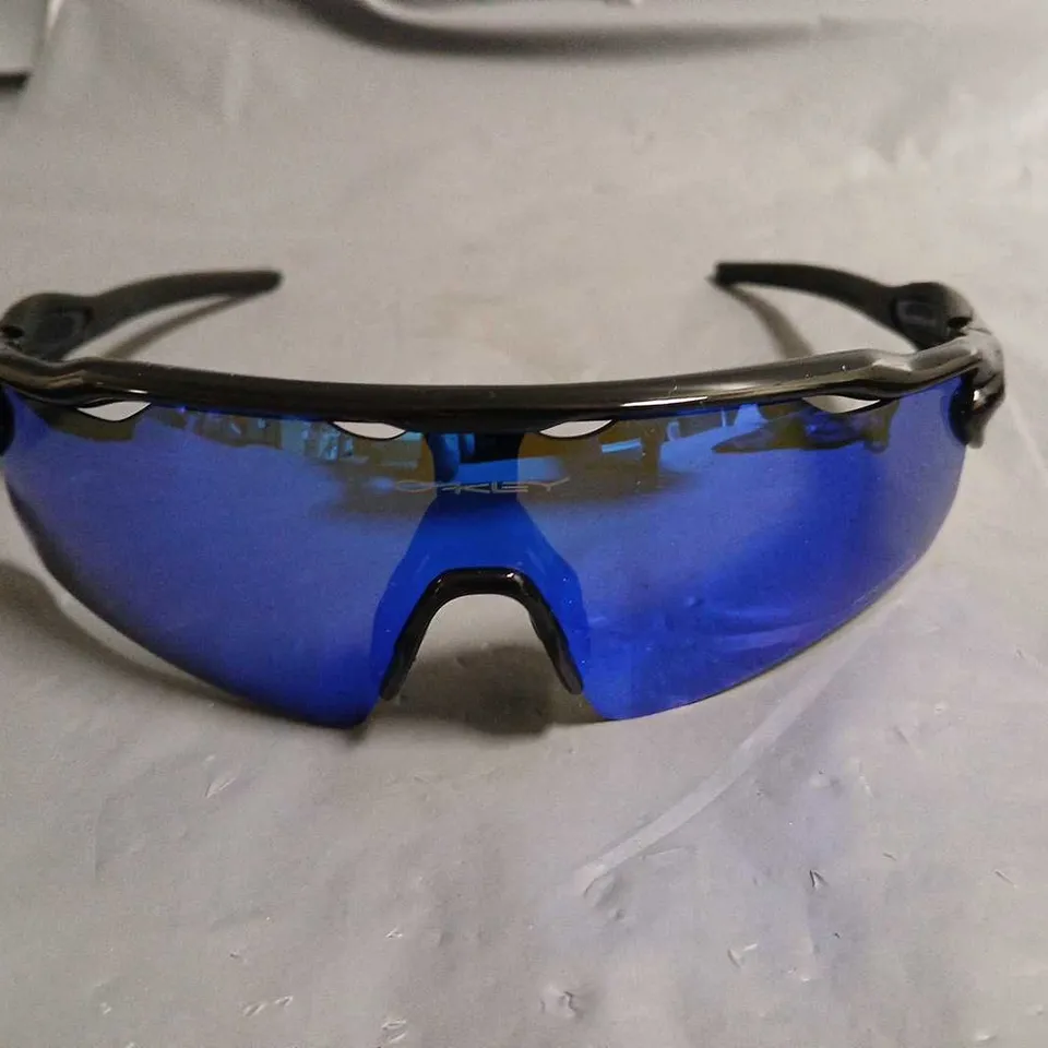 PAIR OF OAKLEY SPORTS STYLE GLASSES