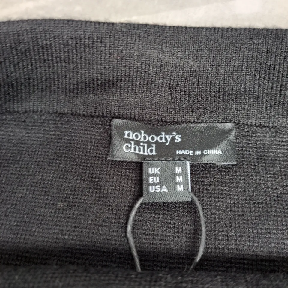 NOBODY'S CHILD BLACK KNIT SKIRT WITH WHITE ZIGZAG TRIM – UK M (EU/M US M)