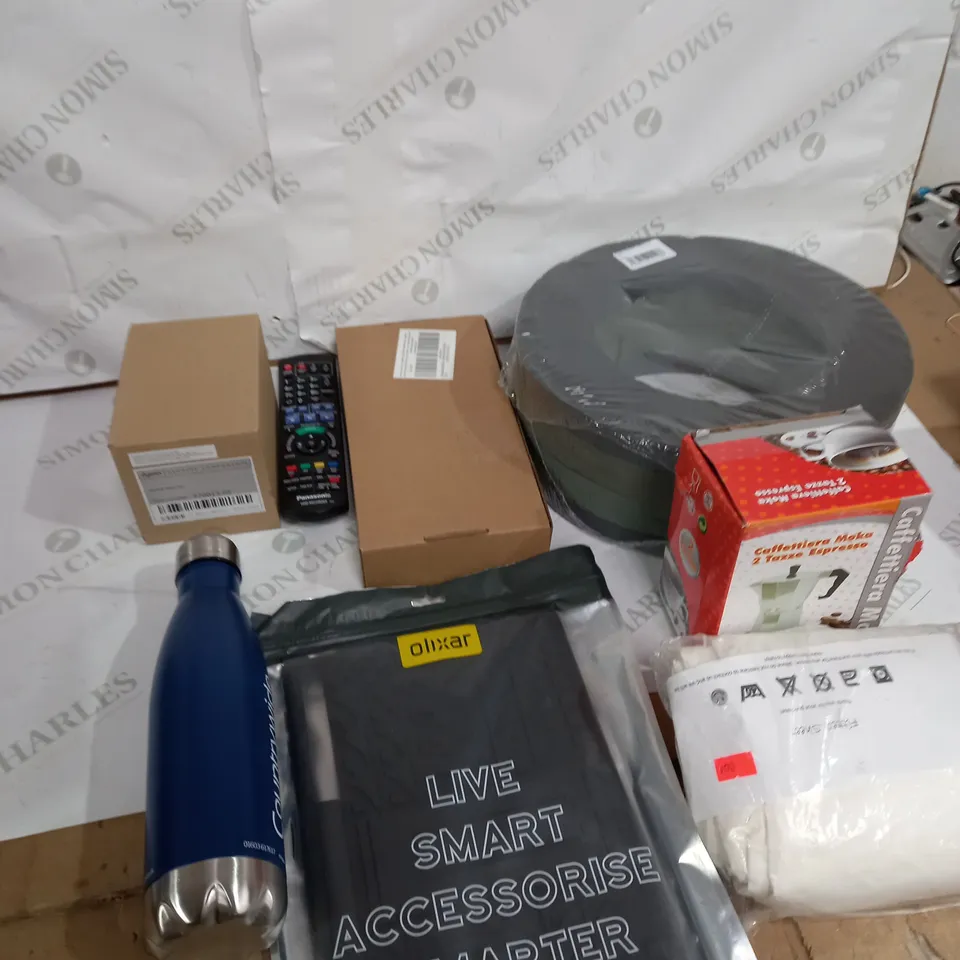 LOT OF ASSORTED HOUSEHOLD ITEMS TOO INCLUDE BOTTLES AND TV REMOTES 