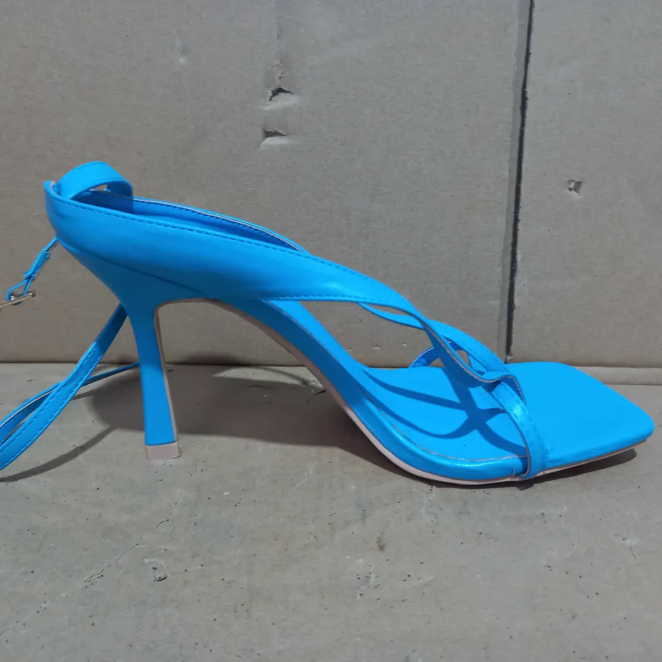 BOXED PAIR OF RAID HEELS IN BLUE UK SIZE 7