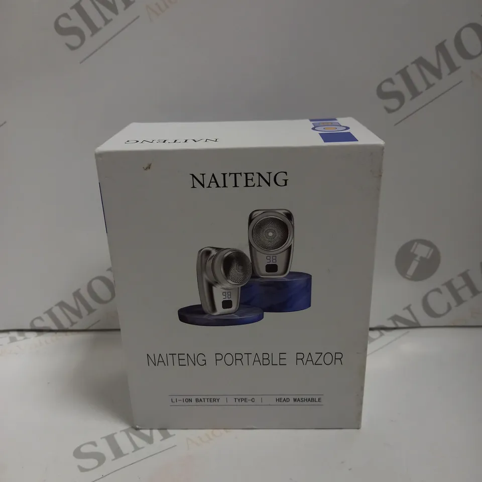 BOXED NAITENG PORTABLE RAZOR 
