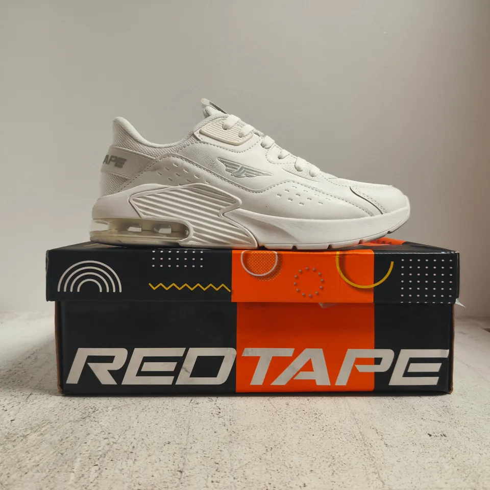 BOXED PAIR OF REDTAPE TRAINERS IN WHITE SIZE UK 9