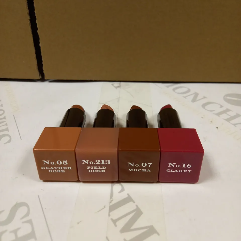 LOT OF 4 BURBERRY LIP COVER STICKS IN VARIOUS COLOURS