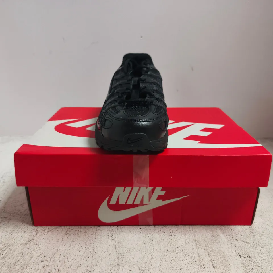 BOXED PAIR OF NIKE P-6000 TRAINERS IN BLACK SIZE UK 5