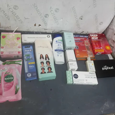 APPROXIMATELY 12 ASSORTED COSMETIC PRODUCTS TO INCLUDE PLOUISE BAD B ENERGY, RADOX SHOWER GEL, AND ORAL-B PRO ETC.