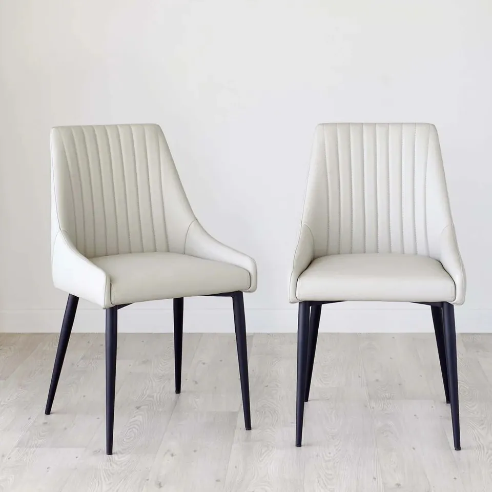 BOXED PAIR OF DANETTI BLAKELY LIGHT GREY FAUX LEATHER DINING CHAIRS