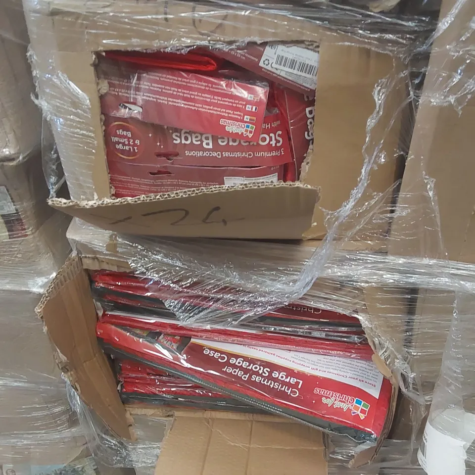 PALLET CONTAINING A VERY LARGE QUANTITY OF ASSORTED ITEMS INCLUDING: SCENTED TEALIGHT ADVENT CALENDARS, CHRISTMAS PAPER STORAGE CASES, LUXURY BAUBLES ECT