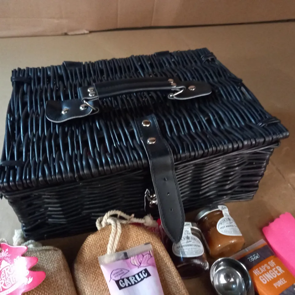 BLACK WICKER BASKET WITH CURRY THEMED CONDIMENTS