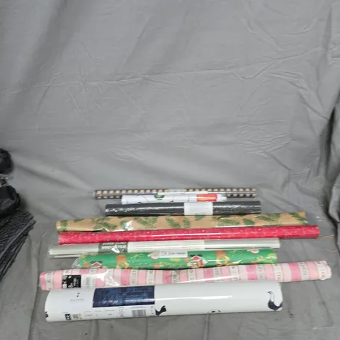 APPROXIMATELY 8 WRAPPING PAPER ROLLS