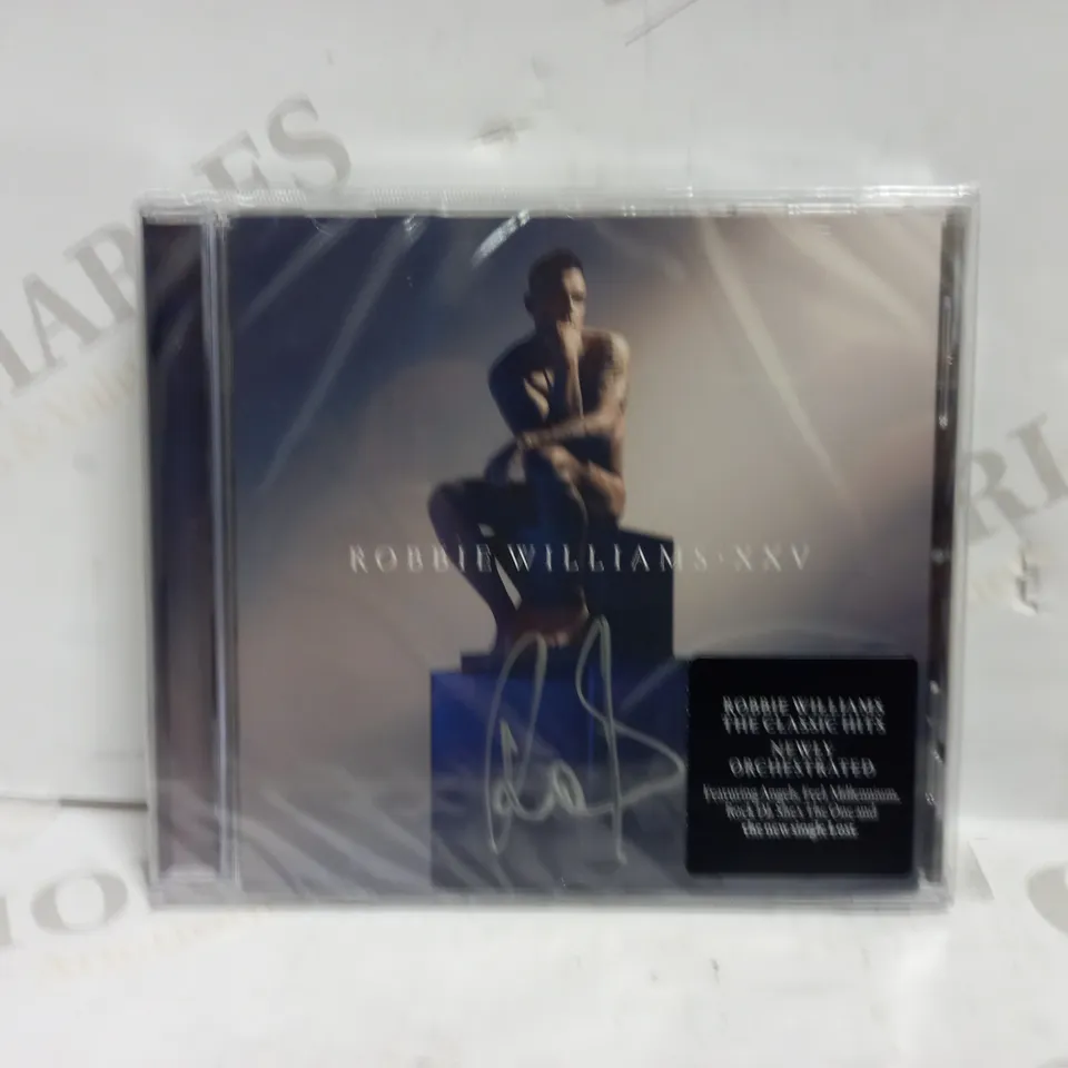 ROBBIE WILLIAMS XXV SIGNED ALBUM