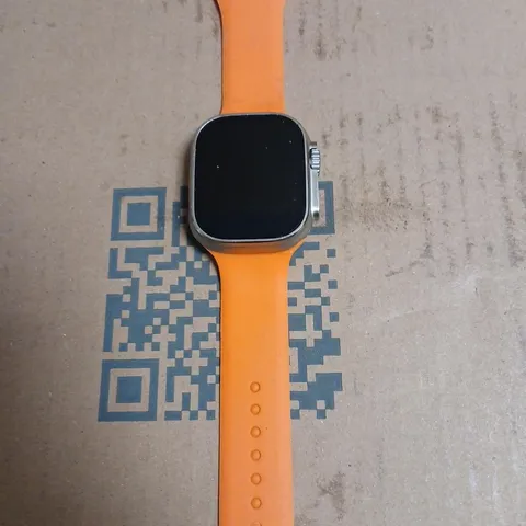 SMART WATCH ULTRA 49MM TITANIUM & CERAMIC CASE – ORANGE BAND (GPS)