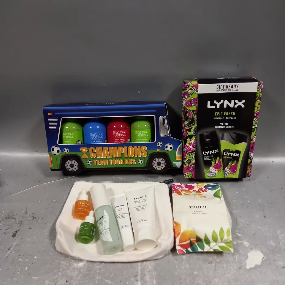 LOT OF 3 ASSORTED COSMETIC BOXSETS TO INCLUDE - LYNX EPIC FRESH BODY COLLECTION - BAYLIS & HARDING CHAMPIONS BODY COLLECTION - TROPIC SKINCARE COLLECTION