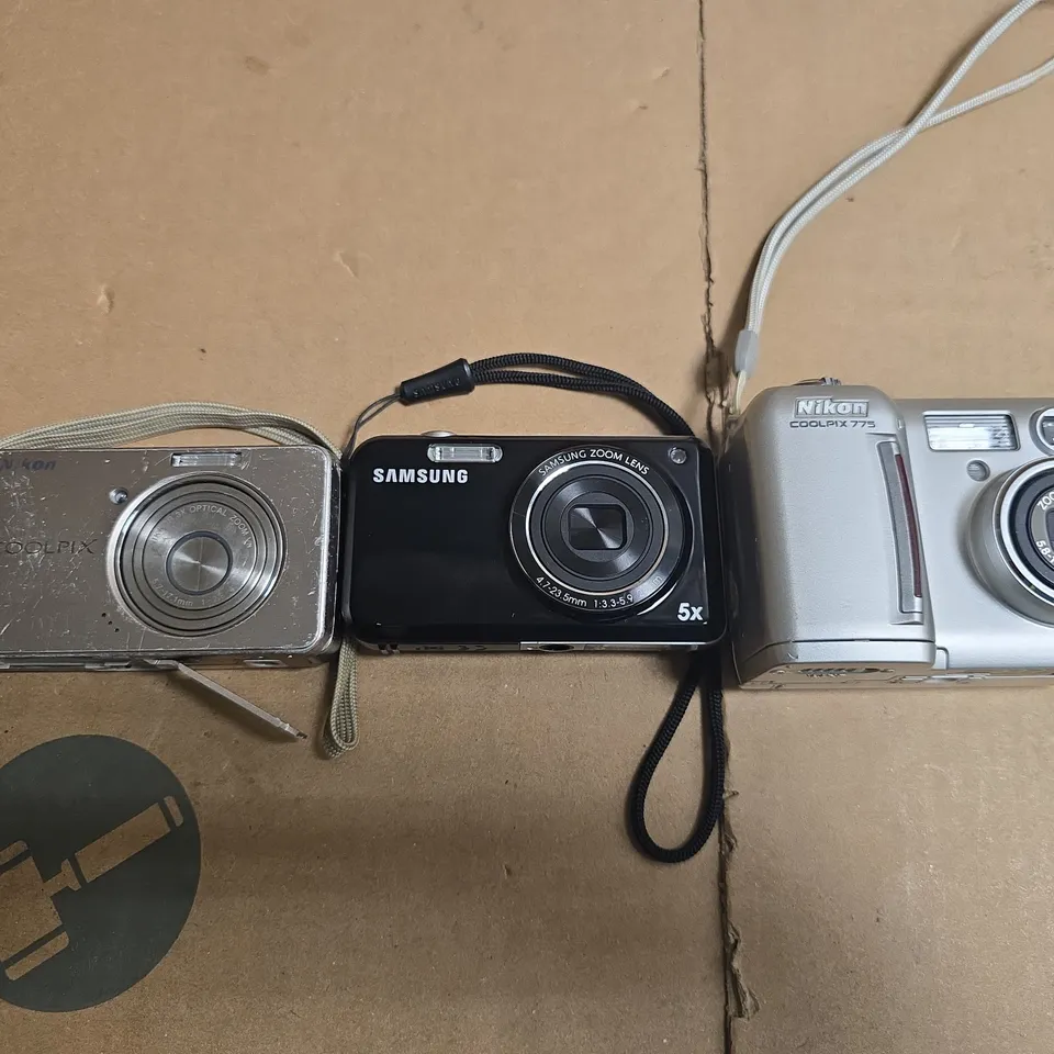 SET OF 3 COMPACT DIGITAL CAMERAS