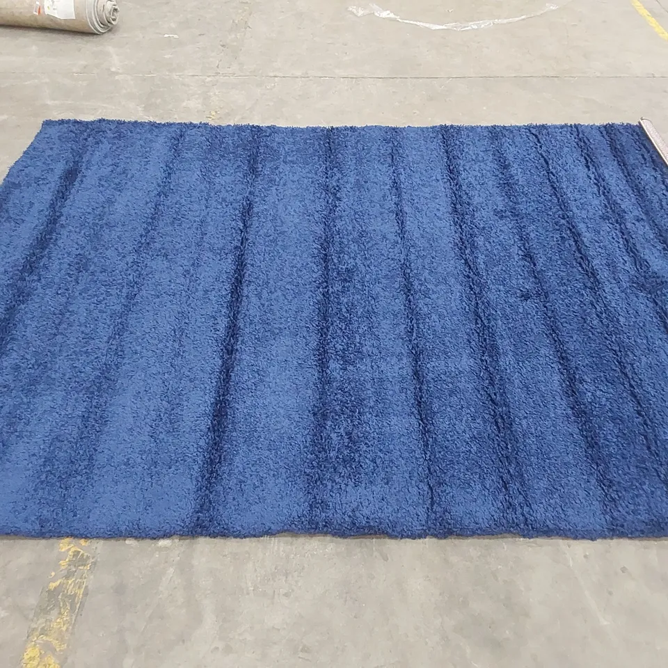 ANNIE-LOUISA SOLID COLOUR MACHINE WOVEN SHAGGY RUG - NAVY // SIZE: 240 X 330cm