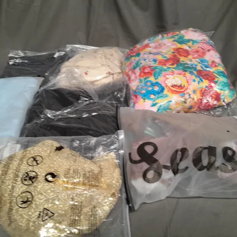 LARGE QAUNTIITY OF ASSORTED CLOTHING ITEMS IN VARIOUS SIZES AND COLORS TO INCLUDE DRESSES, T-SHIRTS AND SOCKS