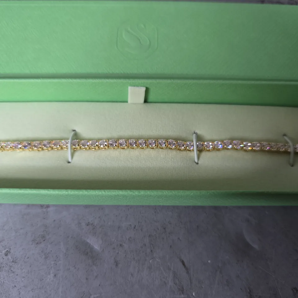 SWAROVSKI MATRIX GOLD-TONE PLATED ROUND CUT WHITE TENNIS BRACELET - LARGE