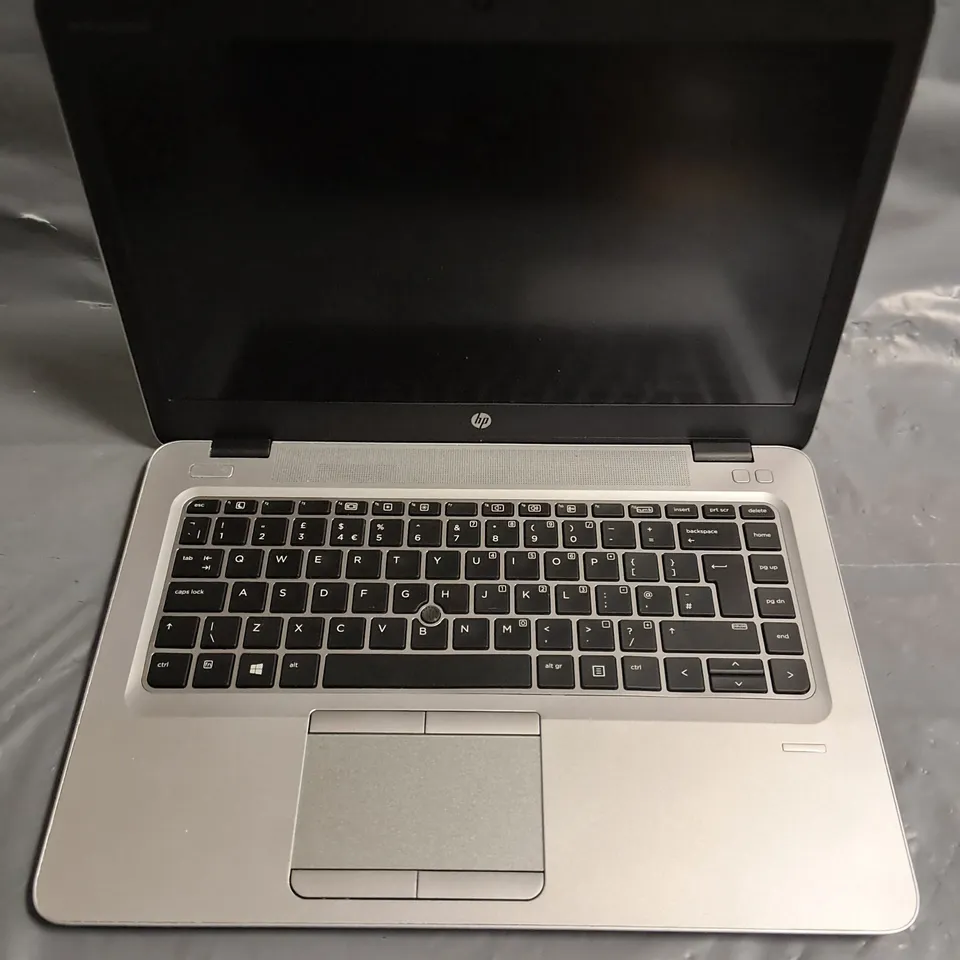 UNBOXED HP LAPTOP IN SILVER