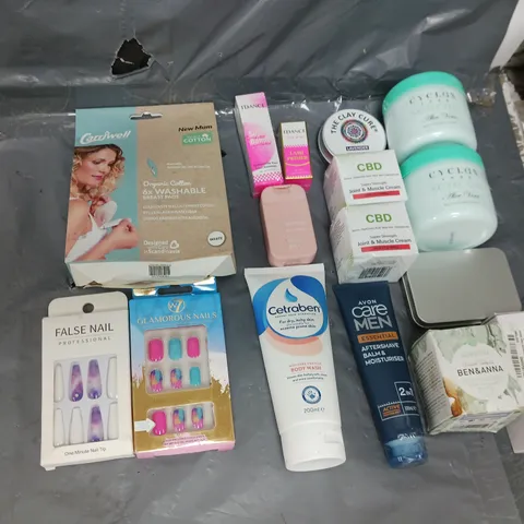 APPROXIMATELY 15 ASSORTED COSMETICS PRODUCTS TO INCLUDE - CYCLAX ALOE VERA, THE CLAY CURE, AND FALSE NAILS ETC.