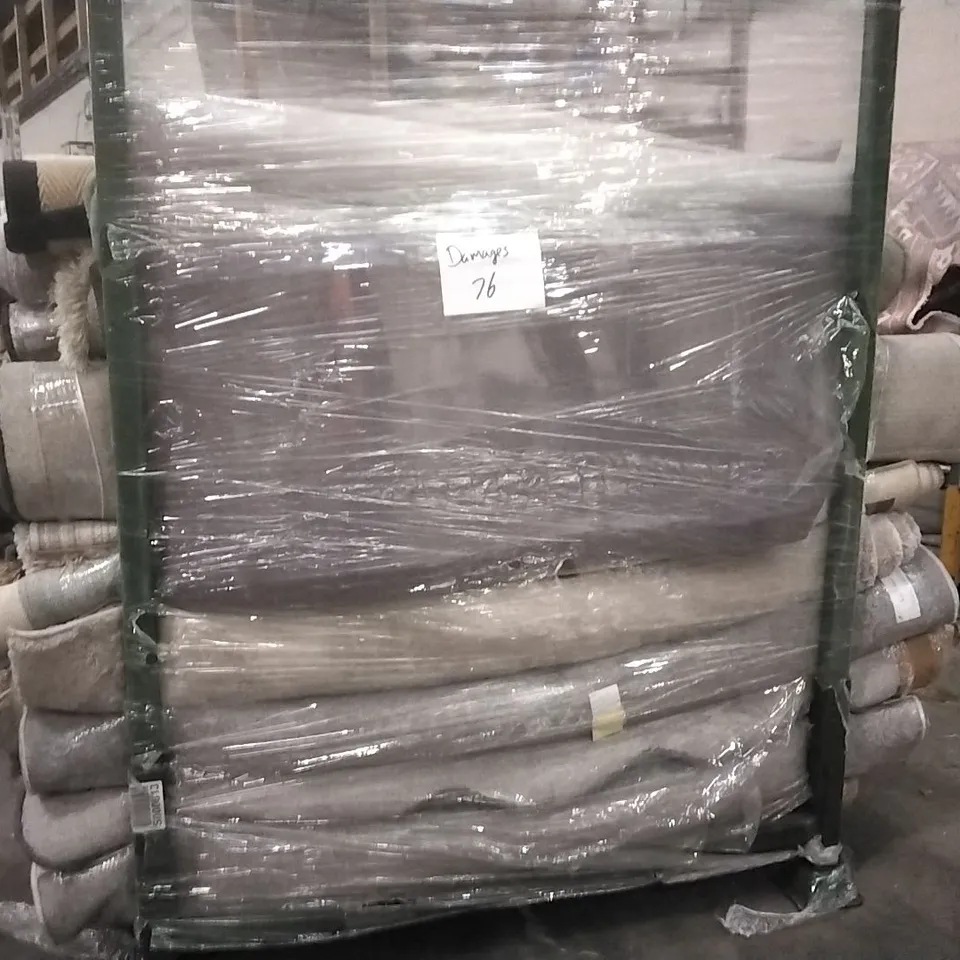 STILLAGE OF APPROXIMATELY 40 DESIGNER RUGS