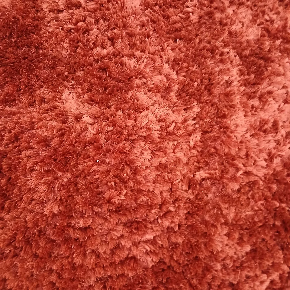 LARGE RED SHAGGY RUG