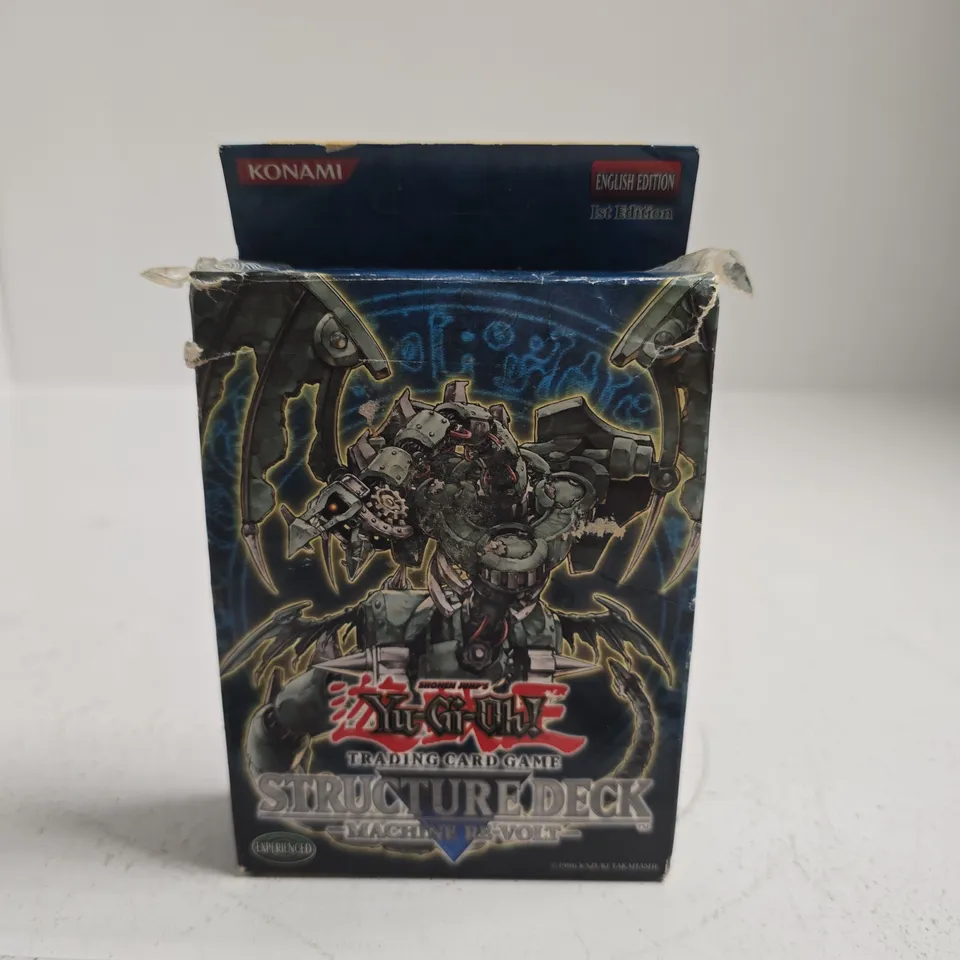TOTE OF APPROXIMATELY 15 ASSORTED ITEMS INCLUDING YU GI OH TRADING CARDS, GO FUCK YOURSELF CARDS AND PALM PALS TOY