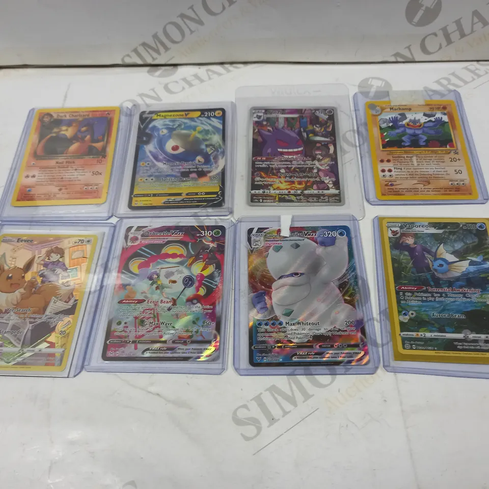 APPROXIMATELY 15 ASSORTED POKEMON CARDS IN CASINGS TO INCLUDE; DARK CHARIZARD, MACHAMP, STARU AND ERIKA'S BELLSPROUT