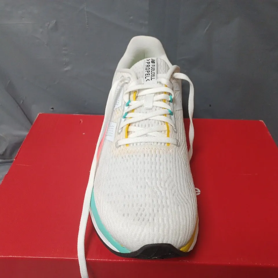 BOXED PAIR OF NEW BALANCE FUELCELL PROPEL TRAINERS IN WHITE - UK 9.5
