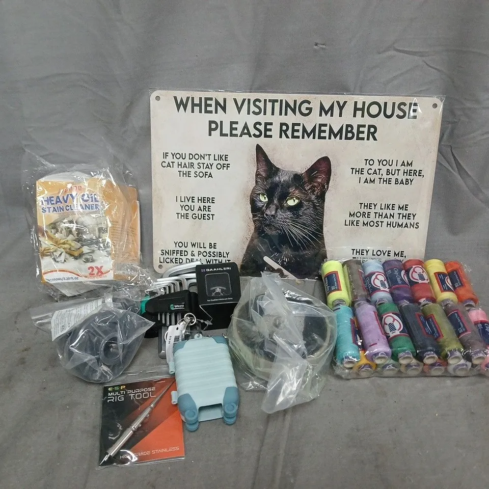 APPROXIMATELY 15 ASSORTED HOUSEHOLD ITEMS TO INCLUDE MULTI PURPOSE RIG TOOL, HEAVY OIL STAIN CLEANER, CHIP CHAIN STRING, ETC