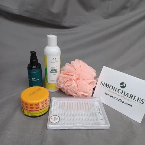 TOTE OF ASSORTED COSMETIC ITEMS TOO INCLUDE , SHAMPOO , LASHES, ETC
