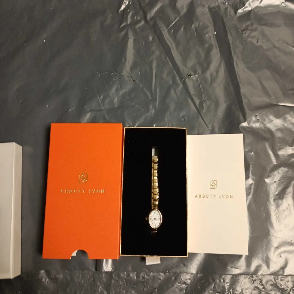 ABBOTT LYON WRISTWATCH – GOLD-TONE BRACELET, WHITE DIAL (BOXED)