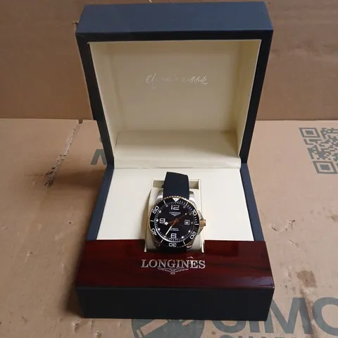 LONGINES WRISTWATCH WITH RUBBER STRAP IN CASE. BOXED