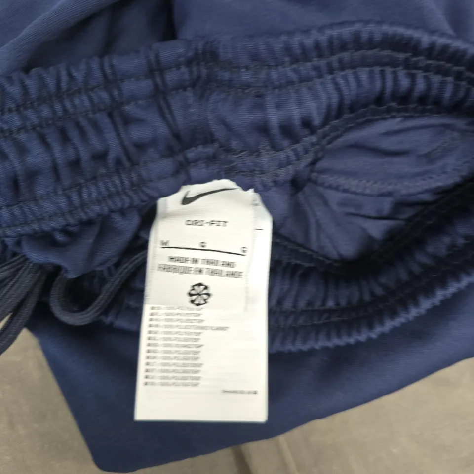NIKE TRACKSUIT BOTTOMS – NAVY SIZE M 