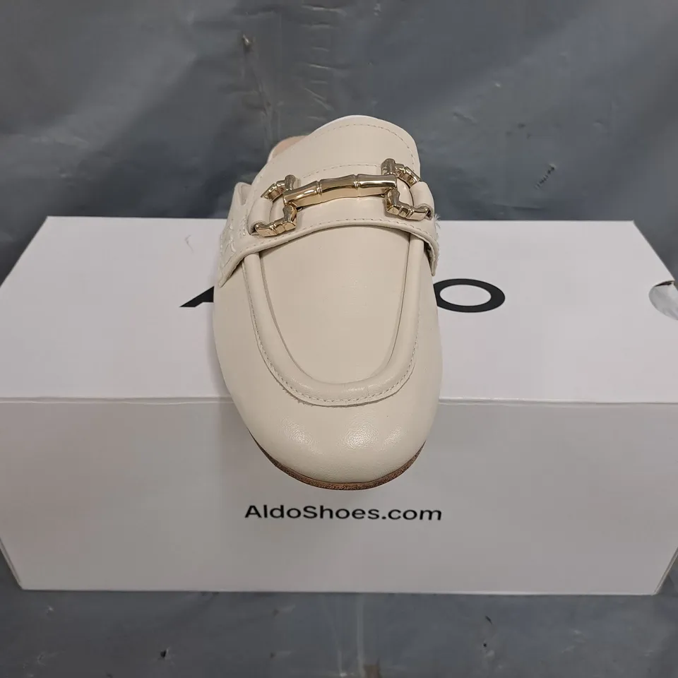 BOXED PAIR OF ALDO OPEN BACK SLIP-ON LOAFERS IN CREAM W. GOLD EFFECT DETAIL SIZE UK 4