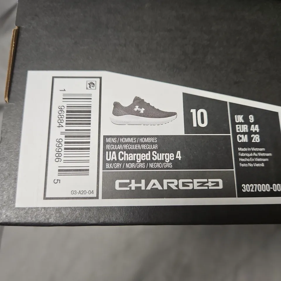 BOXED UNDER ARMOUR CHARGED SURGE 4 RUNNING SHOES – MEN'S, UK9 (US10), BLACK/GRAY