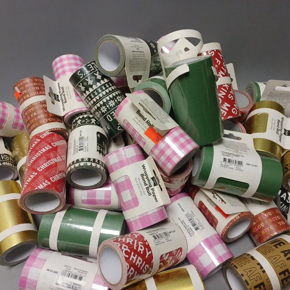APPROXIMATELY 50 ASSORTED TYPO WRAPPING PAPER ROLLS - 10M ROLL, 10CM WIDE