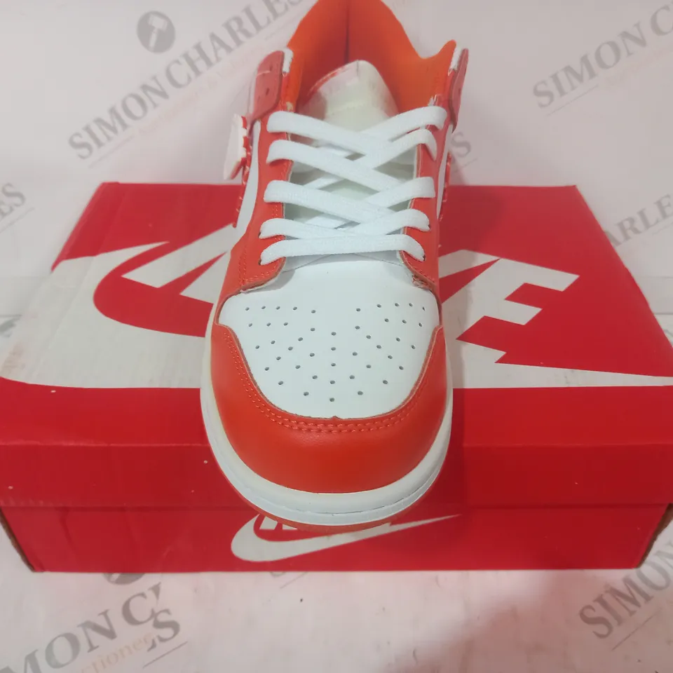 BOXED PAIR OF NIKE SB DUNK LOW PRO SHOES IN ORANGE/WHITE UK SIZE 11