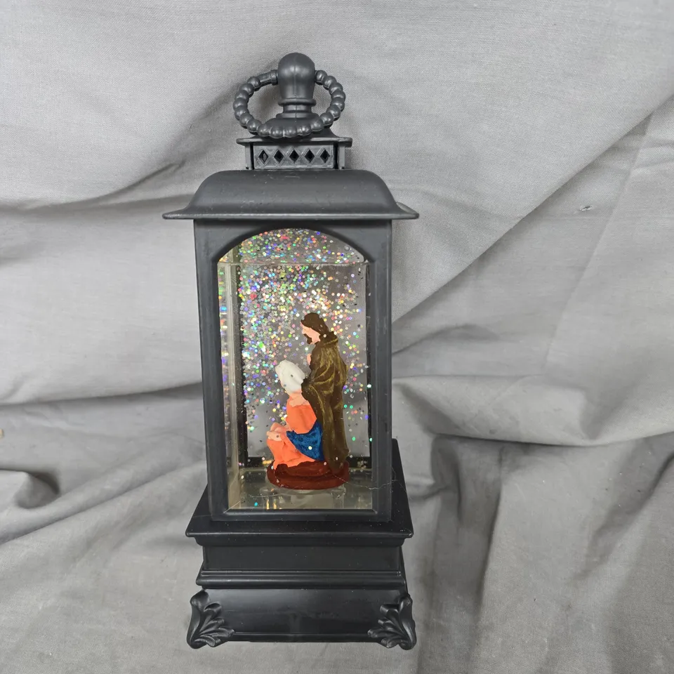 BLACK DECORATIVE LANTERN WITH GLITTERY NATIVITY DIORAMA