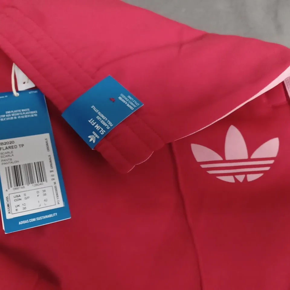 ADIDAS FLARED TRACK PANTS IN RED - UK 10