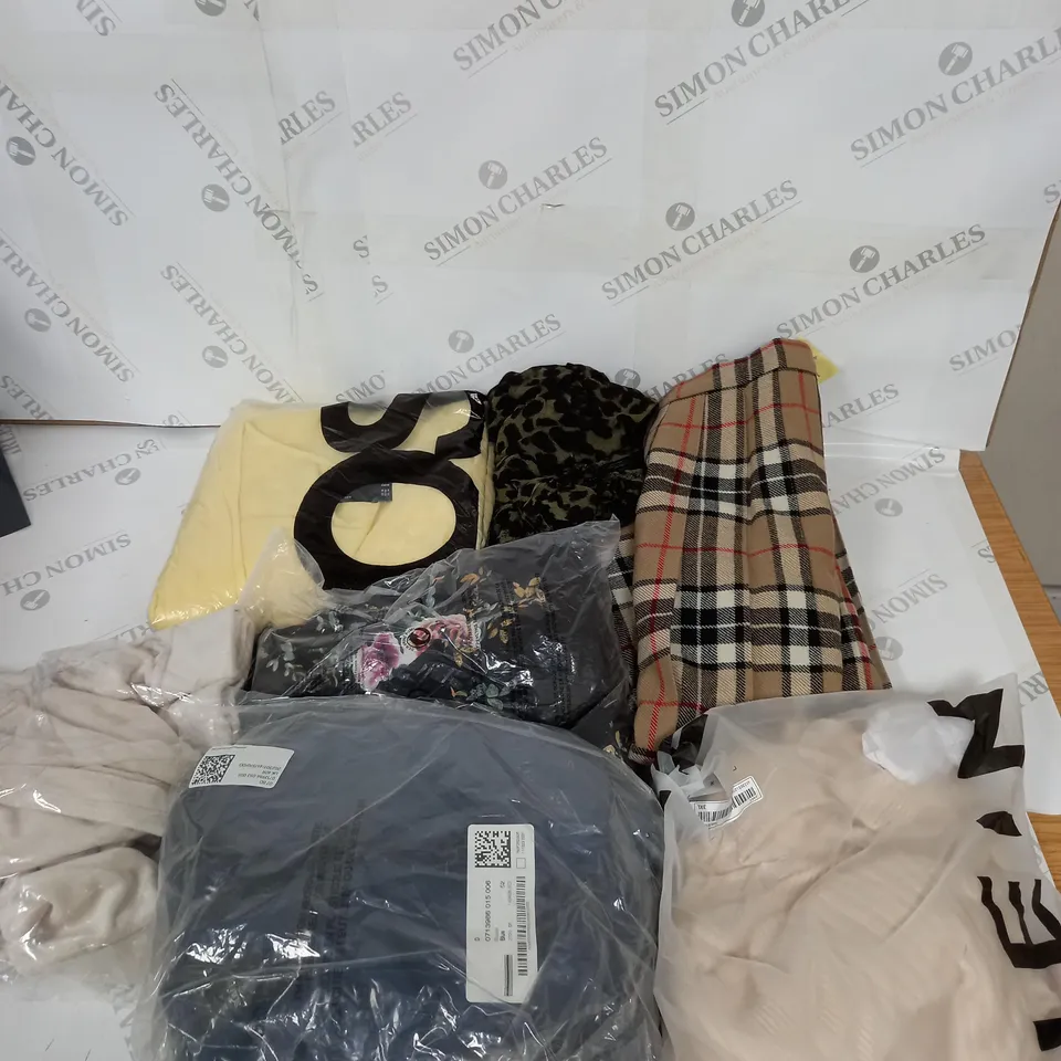 LARGE BOX OF ASSORTED CLOTHING ITEMS IN VARIOUS COLOURS AND SIZES INCLUDING TROUSERS , TOPS AND JUMPERS 