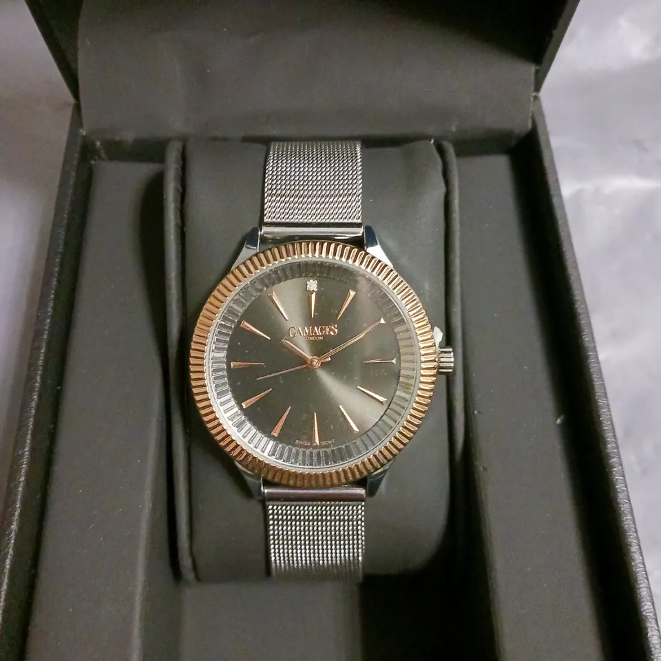 BOXED GAMAGES FLUTED DIAMOND BLACK DIAL WATCH