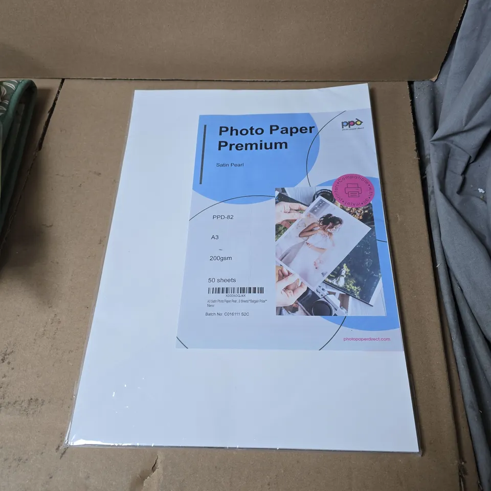 BOX OF APPROXIMATELY 15 ASSORTED HOUSEHOLD ITEMS INCLUDING ULSTER WEAVERS OVEN GLOVES , SOCK AID AND PHOTO PAPER PREMIUM 