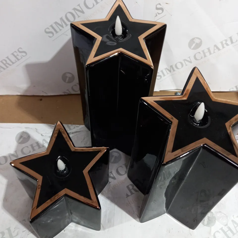 HOME REFLECTIONS CERAMIC STAR PRE-LIT CANDLES