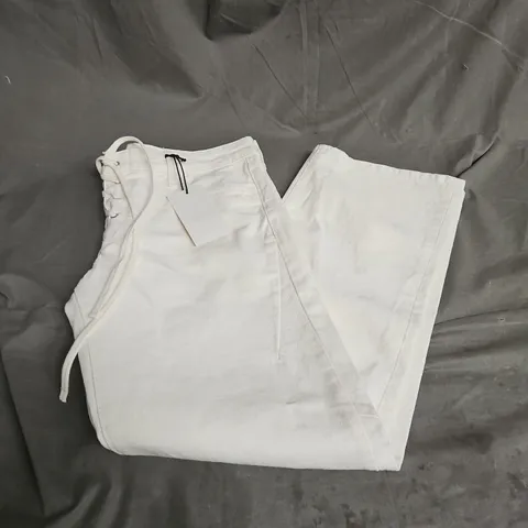 ZARA THE LACE UP BOOTCUT LEG JEANS IN OFF WHITE SIZE 12