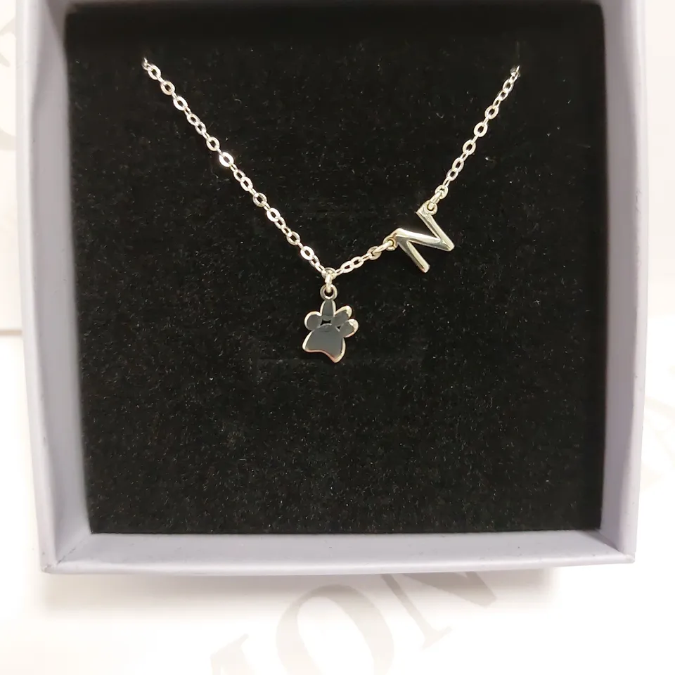 LOVETYS SILVER EFFECT NECKLACE WITH `N` AND PAW DETAIL