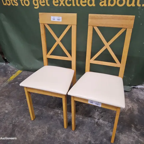 PAIR OF NATURAL WOOD X BACK DINING TABLES CREAM PU SEAT PADS