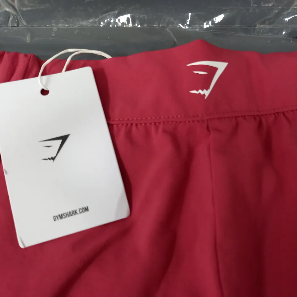 GYMSHARK SCALLOP HEM SHAPED SHORTS IN PINK - MEDIUM