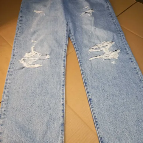 DESIGNER LIGHT BLUE RIPPED BUTTON UP JEANS