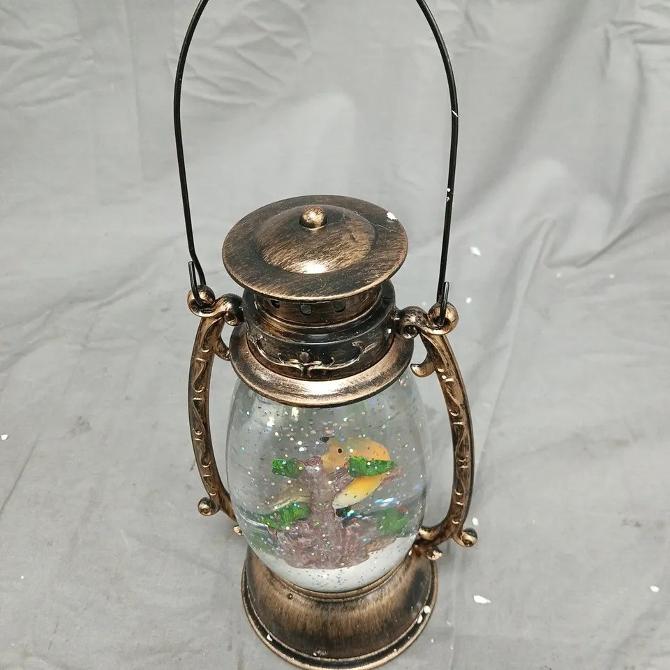 BRASS-TONED GLASS HURRICANE LANTERN WITH DECORATIVE BIRD SCENE