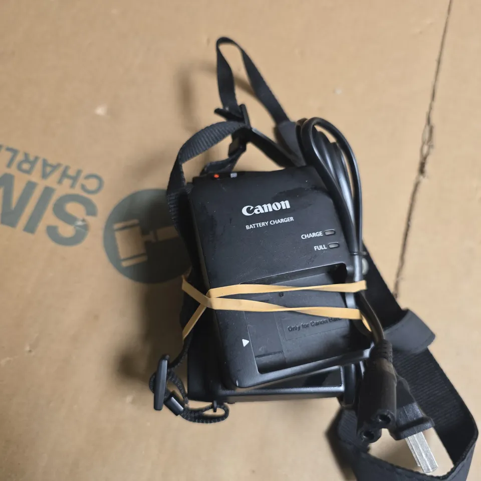 CANON DIGITAL CAMERA WITH 5X ZOOM LENS (12.5-62.5MM) – WITH STRAP AND BATTERY CHARGER 